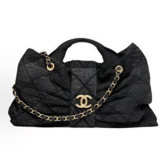 CHANEL 25K bow design with golden logo washed denim single-shoulder handbag, black for women